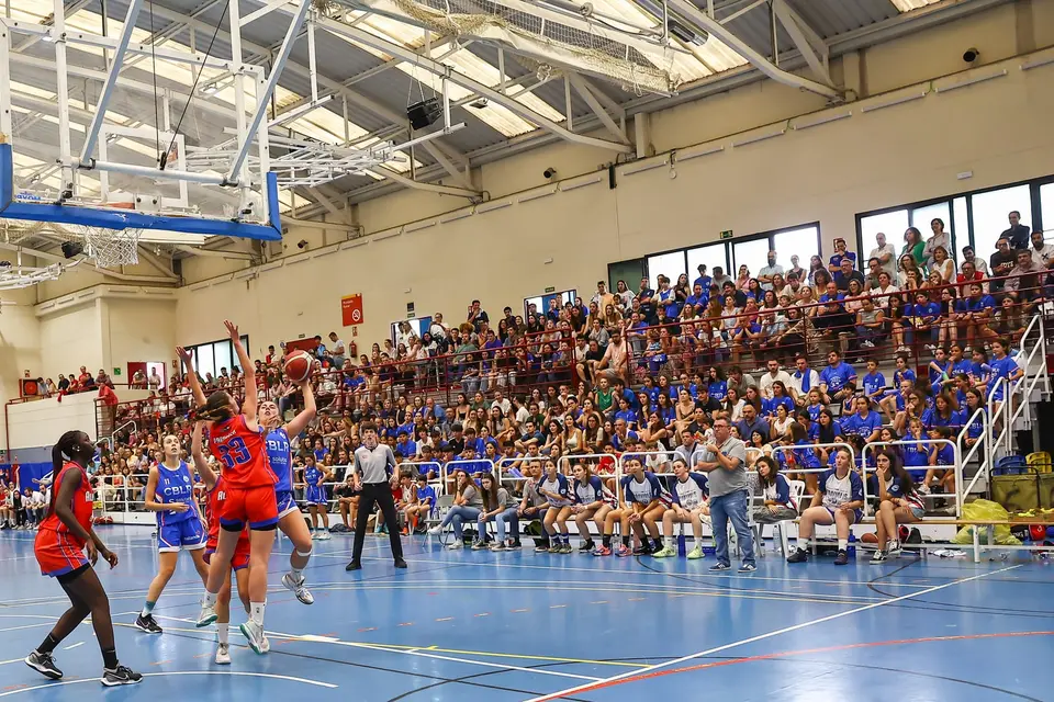 Carlos refereeing a basketball game